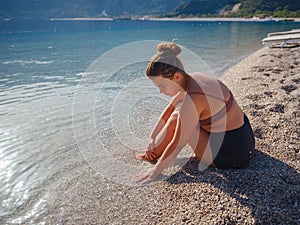 Cheerful woman enjoying the beach