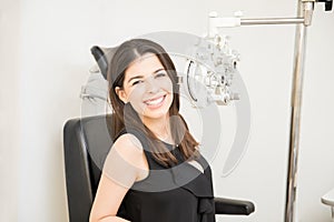 Cheerful woman at eye test center