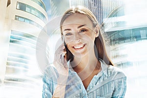 Cheerful woman having discussion on the phone