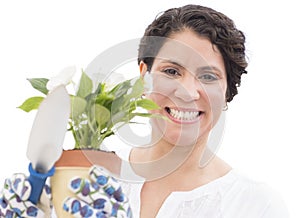 Cheerful Woman Holding Flower Pot And Shovel