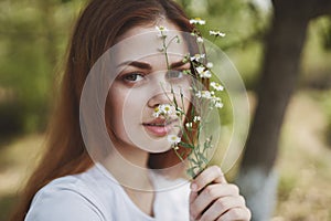 cheerful woman holding flowers Sun freedom journey