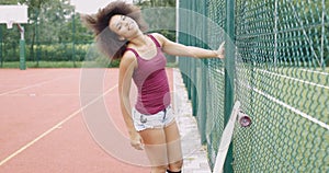 Cheerful woman with longboard