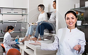 Cheerful woman nail technician welcoming to modern beauty salon