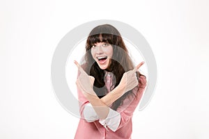 Cheerful woman pointing fingers away