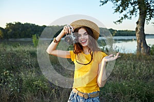 Cheerful woman red lips photographer camera nature fresh air