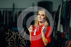 Cheerful Woman with Red and White Martisor Accessory Bow