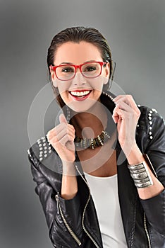 Cheerful woman in rock style
