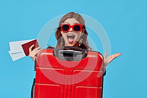 cheerful woman Tourist red suitcase passenger airport flight documents