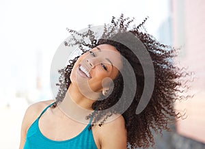 Cheerful young african american woman smiling