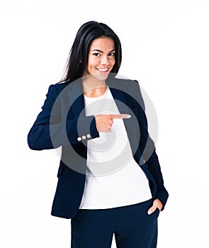 Cheerful young businesswoman pointing finger away