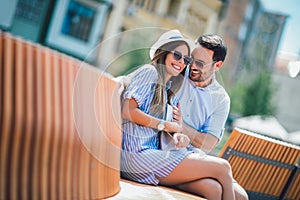 Cheerful young couple having fun and laughing together