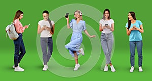 Cheerful young european women in casual, headphones typing on phones, enjoy music