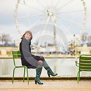 Cheerful young girl in the Tuileries