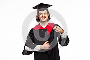 Cheerful young graduated student man isolated on white background