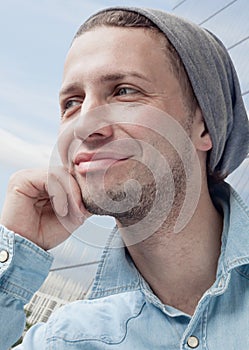 Cheerful young man Looking Away