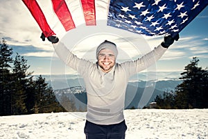 Cheerful young man with USA flag