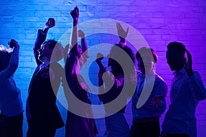 Cheerful Young People Dancing Having Fun At Night Party Indoor