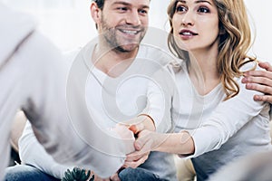 Cheerful young woman expressing her gratitude