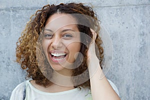 Cheerful young woman laughing