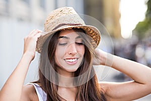 Cheerful young woman looking down