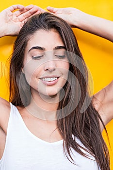 Cheerful young woman looking down