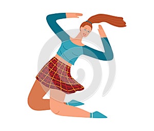 Cheerful young woman with red hair dancing. Female dancer in casual clothes enjoying herself. Happy dance movement and