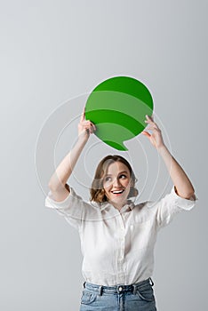 cheerful young woman in white shirt