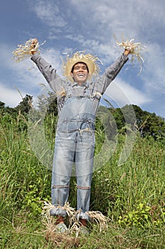 Cheering boss scarecrow