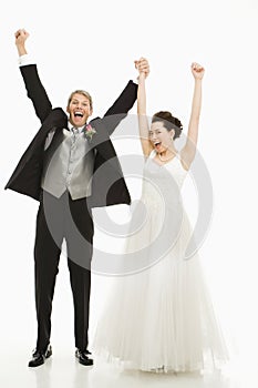 Cheering bride and groom.