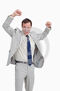 Cheering businessman with his arms up
