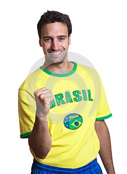 Cheering guy with brazilian jersey