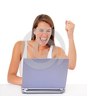 Cheering woman with laptop