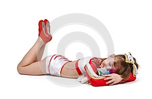 Cheerleader with color pompons sleeps