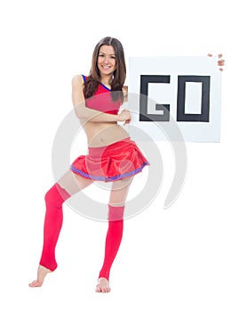 Cheerleader dancer from cheerleading team holding sign go