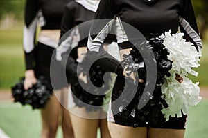 Cheerleading women dancing with pompom