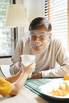 Cheers Grandpa and grandson looking