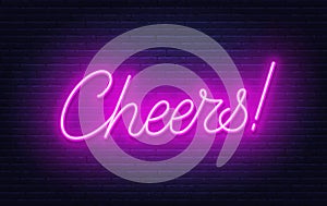 Cheers neon sign on brick wall background.