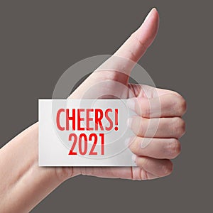 Cheers year 2021 with hand