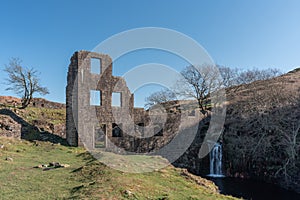 Cheesden Lum Mill and waterfall near Haywood, Greater Manchester