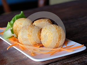 Cheese ball in white plate