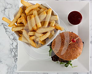 Cheese beef burger french fries tomato ketchup
