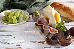 cheese board with baguette