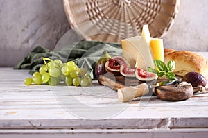 cheese board with baguette