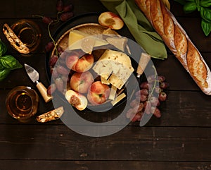 cheese board and fresh fruit grapes