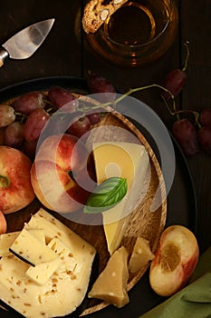 cheese board and fresh fruit grapes