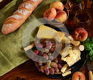 cheese board and fresh fruit grapes