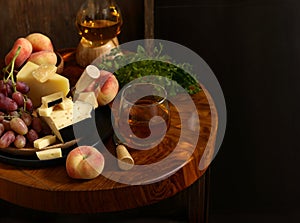 cheese board and fresh fruit grapes
