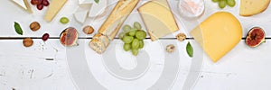 Cheese board platter plate Swiss bread Camembert copyspace banner top view