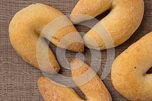 Cheese bread known as Chipa in Brazil, shaped like a horseshoe.