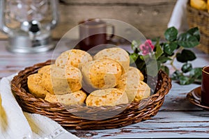 Cheese bread, chipa with coffee and flowers